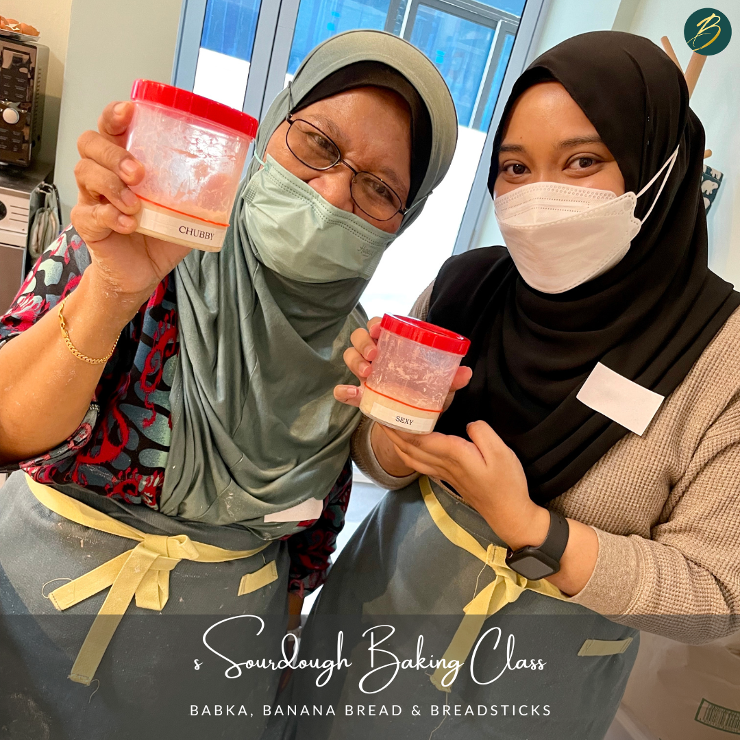 Two female participants with their sourdough starter