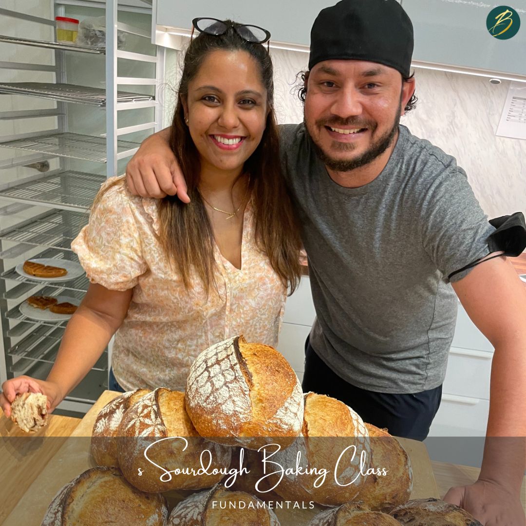 couple at sourdough baking class