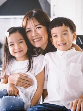 a woman with two children