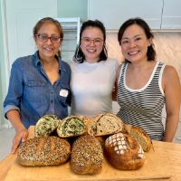 group of women baking sourdough breads