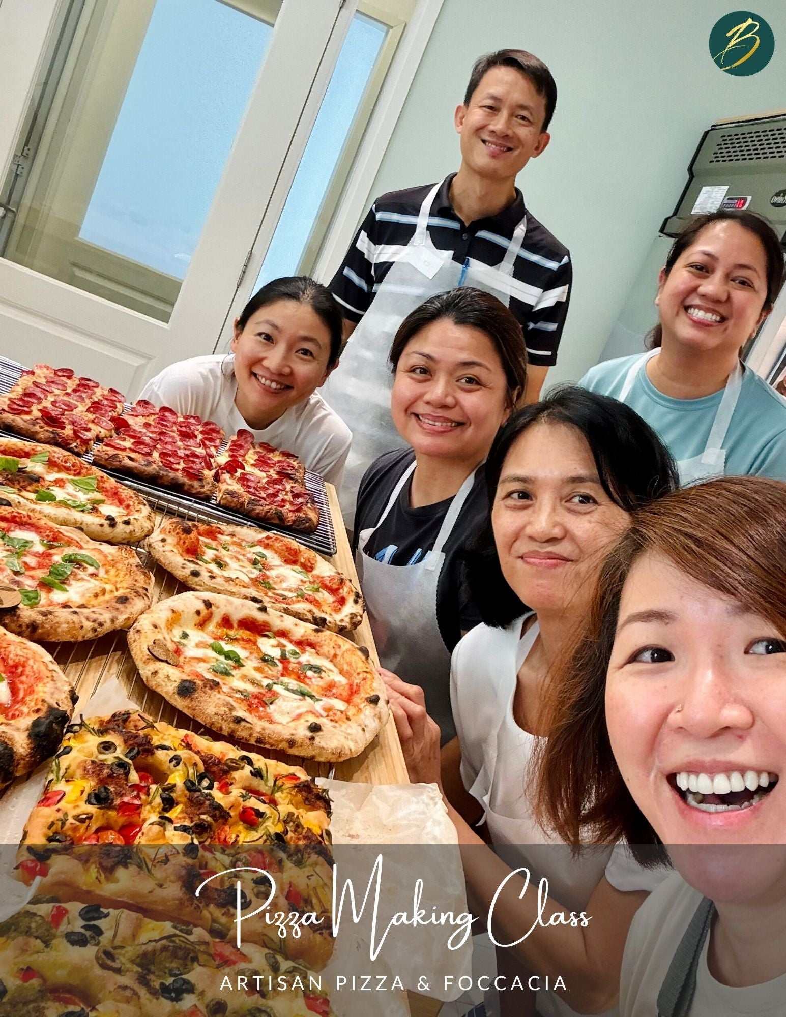 Participants shaping dough in a hands-on pizza making class in Singapore with instructional materials and professional ingredients on the table