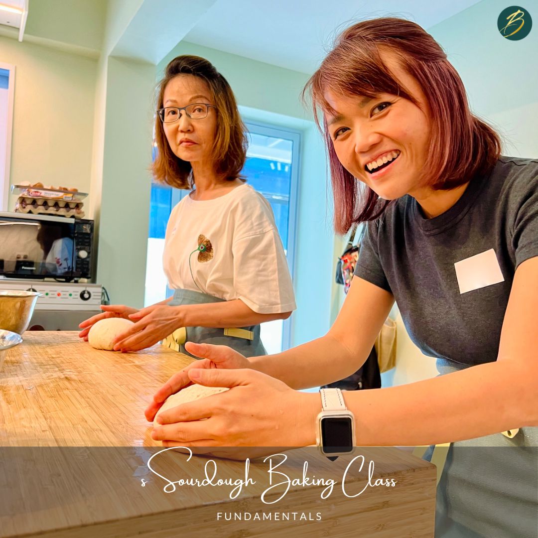 two women preparing sourdough bread