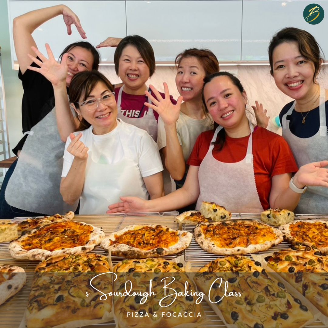 group of people baking pizza bread
