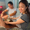 Group of students learning sourdough baking techniques in a hands-on class